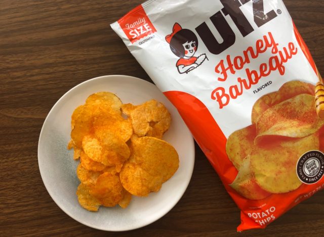 utz honey bbq chips in a bag and on a plate.