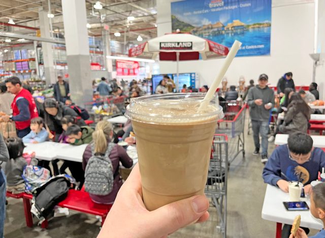 Costco's Cold Brew Latte Freeze held aloft in the warehouse club's food court