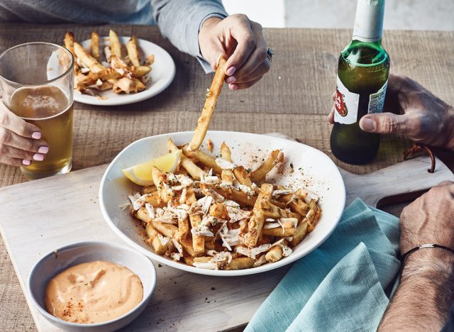 Crab-topped bang fries at Bonefish Grill