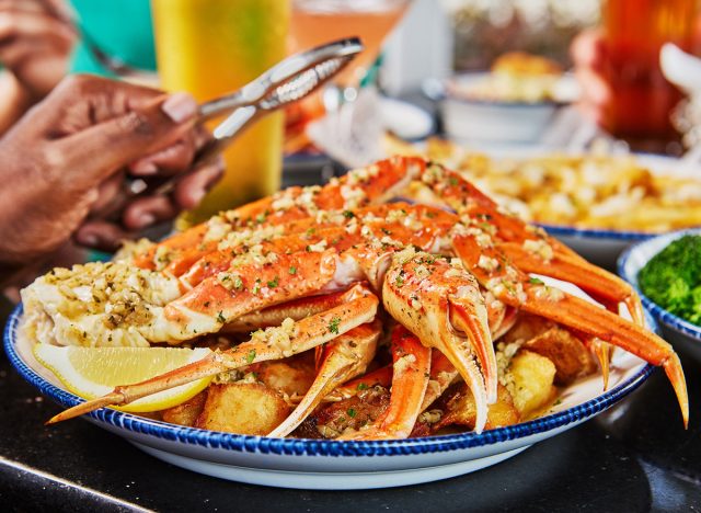 Snow Crab Legs topped with Roasted Garlic Butter at Red Lobster
