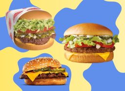 A trio of fast-food cheeseburgers against a colorful background