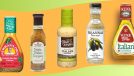 An array of bottled Italian salad dressings set against a colorful background