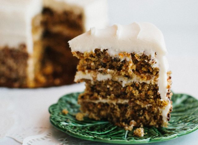 A slice of carrot cake on a green plate at Muddy's Bake Shop in Memphis