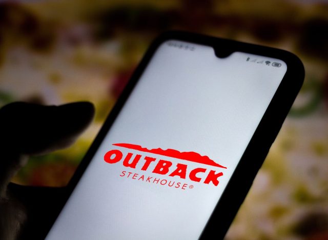 Outback Steakhouse logo on phone