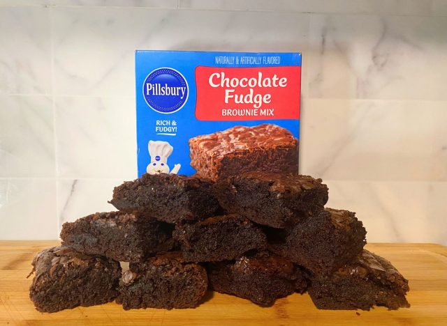 Pillsbury Chocolate Fudge brownies and box on a wooden cutting board