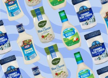 multiple bottles of salad dressing brands on a blue background