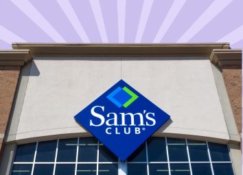 The storefront of a Sam's Club warehouse against a colorful background