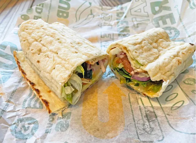 The new Cali Caprese flatbread wrap from Subway, opened upon its wrapper
