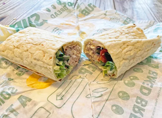 The new Homestyle Chicken Salad flatbread wrap from Subway, opened upon its wrapper
