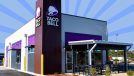 Taco Bell exterior on blue striped background