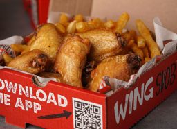 Wing Snob wings and fries in red box