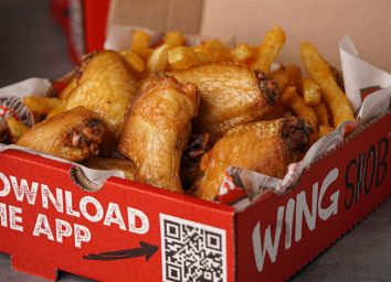 Wing Snob wings and fries in red box