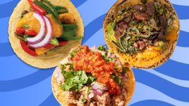 as assortment of tacos on a vibrant designed blue background