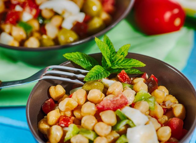 chickpea pepper salad in brown bowl close-up