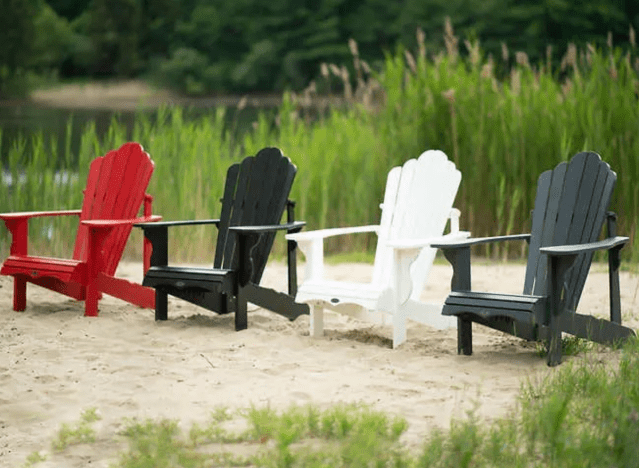 adirondack chairs ona a beach.