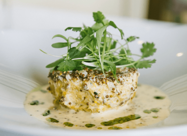 davio's crab cake with garnish on a plate.