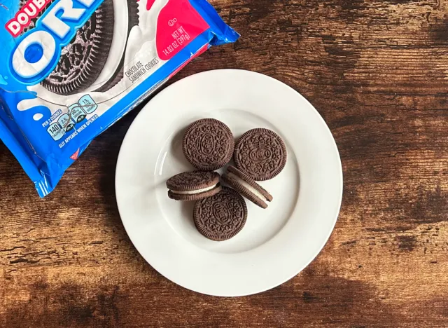 double stuf oreos on a plate next to a plate of double stuf oreos