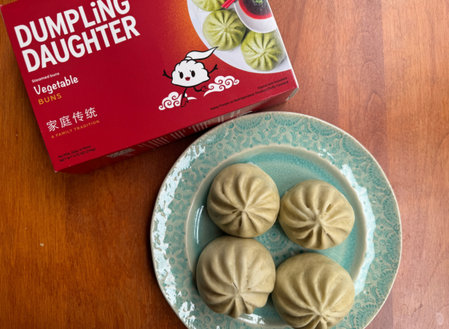 dumpling daughter box and dumplings on a plate. 