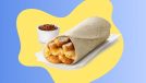 a chick-fil-a breakfast burrito with a dipping sauce on a blue and yellow designed background