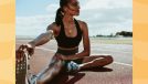 fit brunette woman stretching outdoors on track before running workout on sunny day