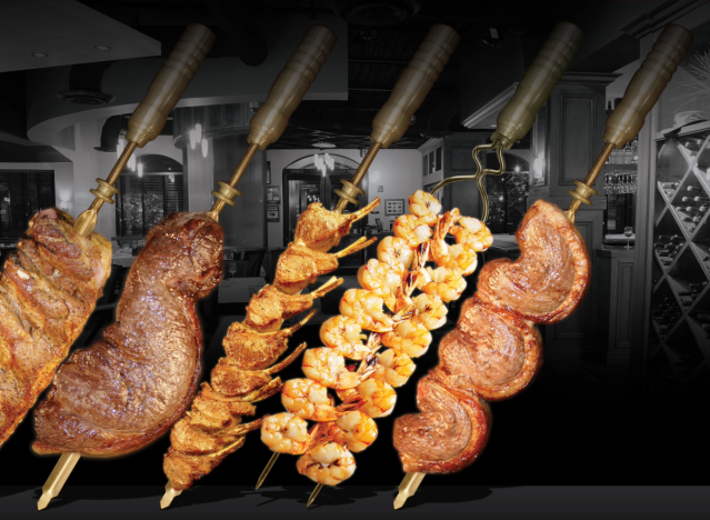 assorted meats on skewers.