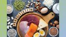 high-protein diet foods like eggs, cheese, and beans on black countertop