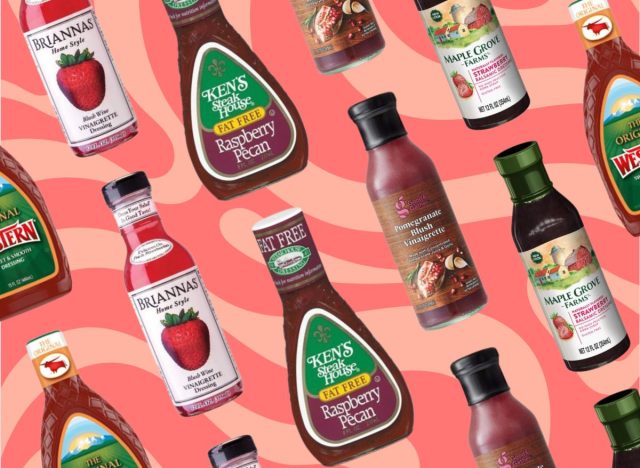 bottles of different salad dressings on a red and pink background