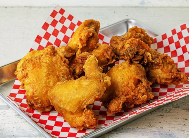 a platter of fried chicken from honeys kettle.