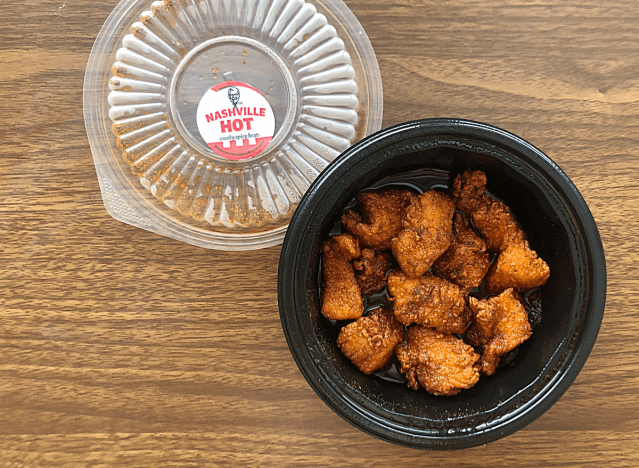 an open container of kfc nuggets. 