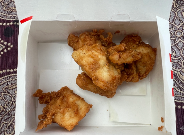 kfc nuggets in an open box.