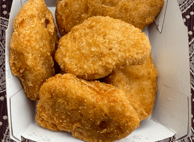 mcdonalds nuggets in an open box.