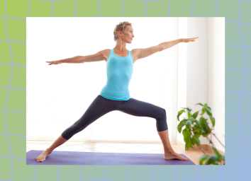 middle-aged woman in blue tank top and leggings doing yoga exercise on mat in bright living space