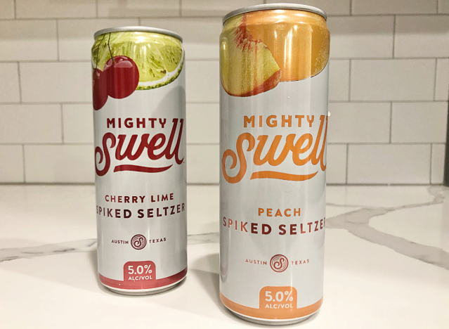 mighty swell seltzer cans on counter.