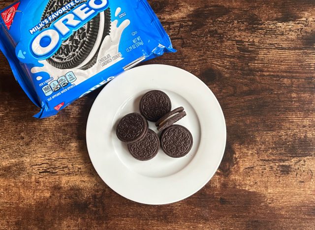 oreos on a plate next to a package of oreos