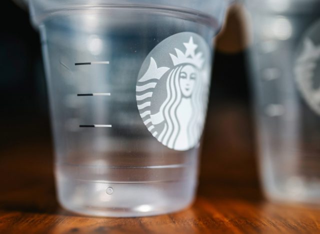 close-up of starbucks cold cup with measurement lines