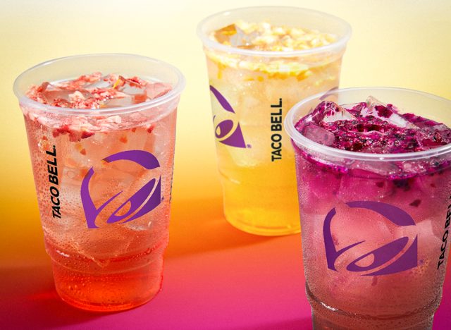three taco bell aguas refrescas drinks on a gradient background