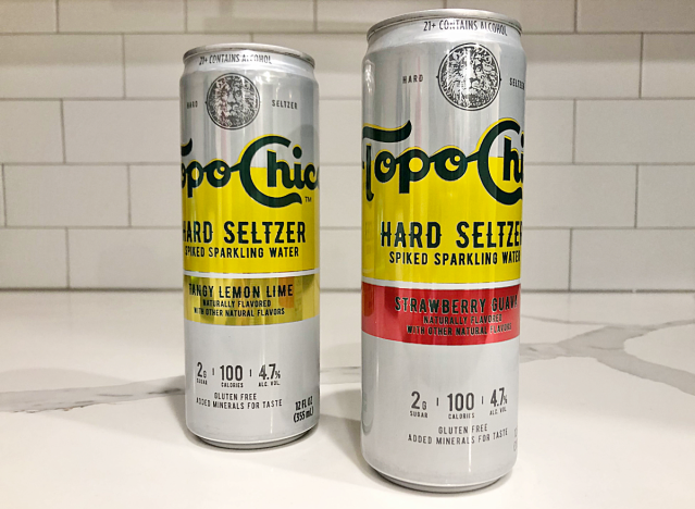 topochico seltzer cans on a counter.