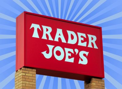 trader joe's sign on a blue background