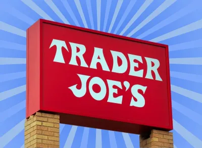 trader joe's sign on a blue background