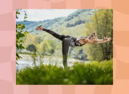 fit blonde woman doing yoga, warrior III pose in a grassy meadow by a lake