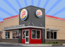 Burger King storefront on striped blue background