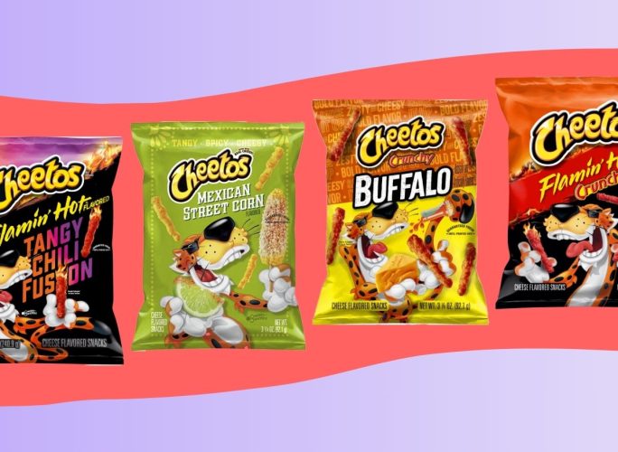 An array of Cheetos snacks in several flavors set against a colorful background