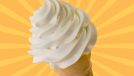A vanilla soft serve ice cream cone set against a colorful background