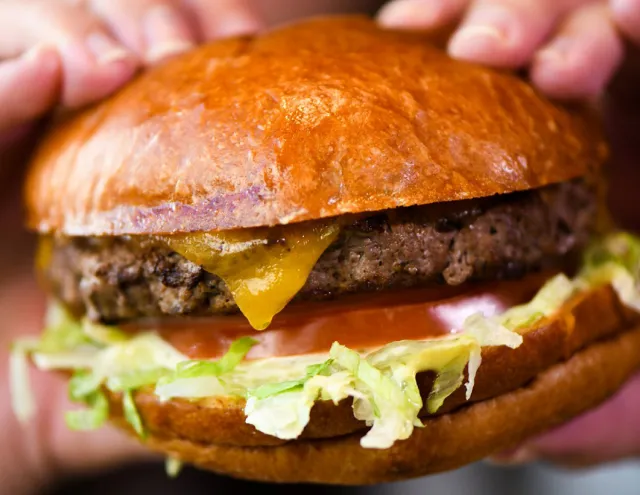 A closeup of the classic burger from Hopdoddy