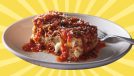 A saucy slice of Carrabba's lasagna on a white plate, set against a colorful background.