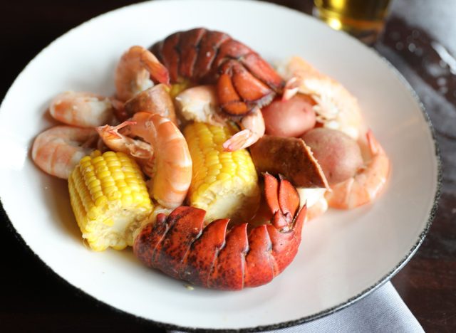 A seafood pack to go from McCormick & Schmick's, including lobster, shrimp, andouille sausage and corn