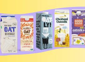 An array of different brands of non-dairy oat milk set against a colorful background