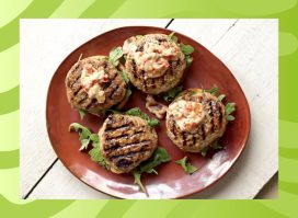 chicken burgers on a plate and a green background