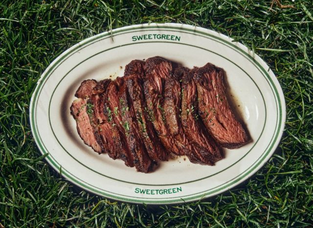 Plate of Sweetgreen steak on bed of grass