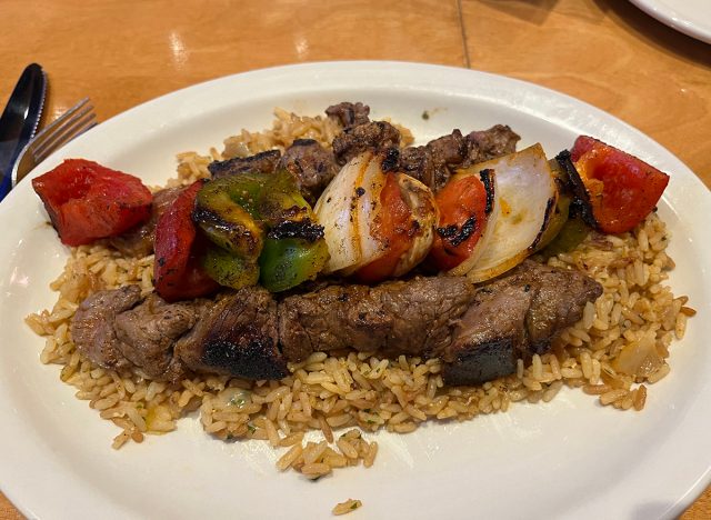 Steak kebab over seasoned rice at Texas Roadhouse